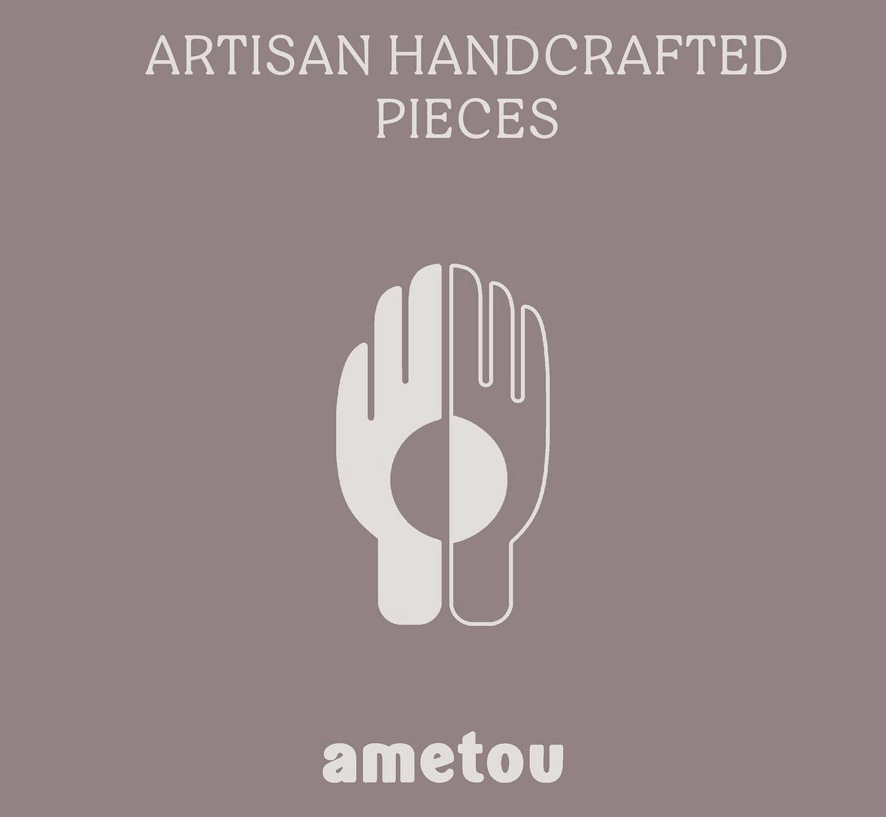 The logo of Ametou, a sustainable fashion brand known for its artisan handcrafted pieces.