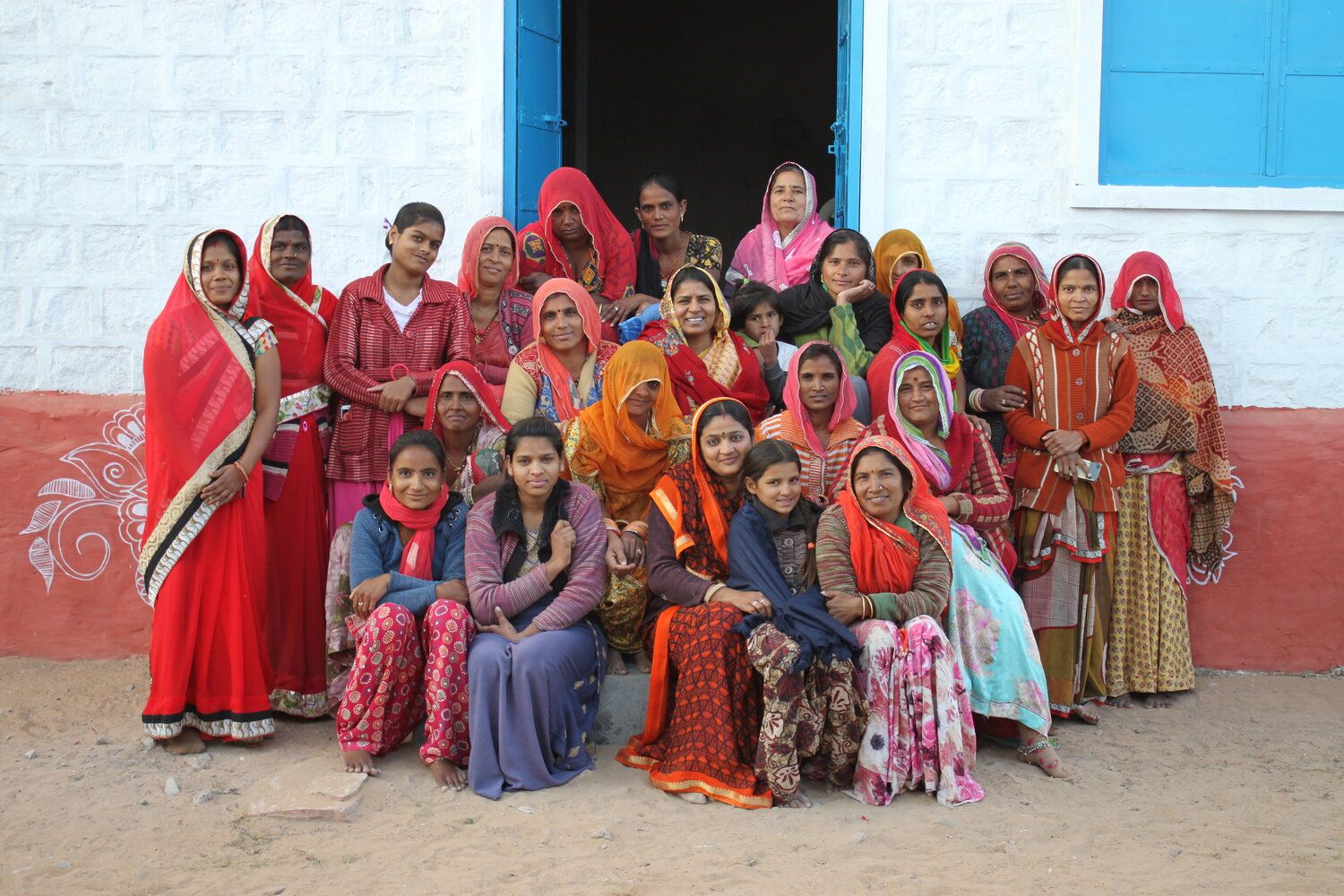Exploitative labor practices: Image of a group of women artisans and workers who are part of the Saheli Women organization.